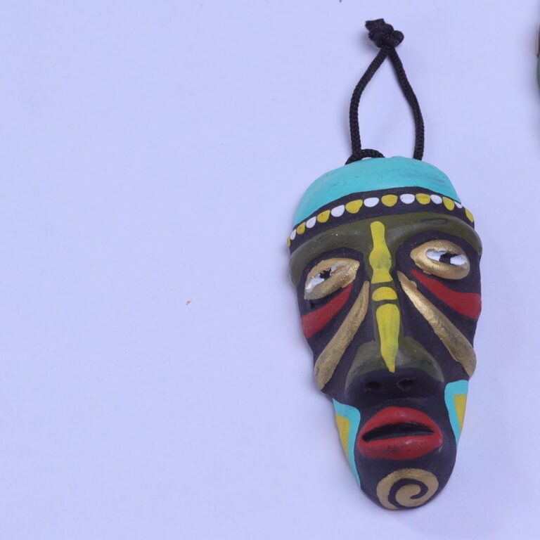 Handcrafted Terracotta Adivasi Face Wall Hanging – A stunning piece of tribal art that brings heritage and rustic charm to your walls.